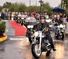 John and his biker entourage hit the red carpet at Club Blue.