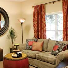 The red & gold curtains give the lounge the pop of color it needed.