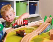 Bo Hunt enjoys the large space for his toy train set, ideal for the little engineer.
