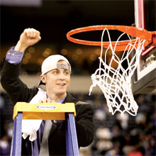 Ocalan Matt McCall takes his turn cutting down the net after the Gators won their second national championship in basketball. Matt serves as Billy Donovan’s director of basketball operations.