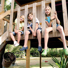 Addy, Arin, and Ashley Conrad's treehouse features plenty of charm and comfort for the sisters.
