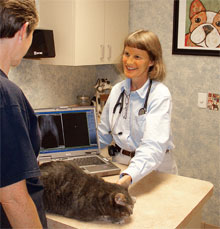 Dr. Pam Neiser explains her findings using a wireless laptop to display a digital x-ray.
