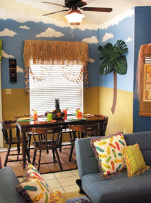 A bamboo skirt is a playful window treatment for the tropical-inspired eating area.