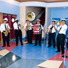 The brass band, The Storyville Stompers out of New Orleans, entertained the crowds at the theater’s grand opening on August 11.