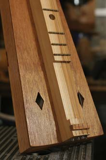 George creates a variety of details for his dulcimers.